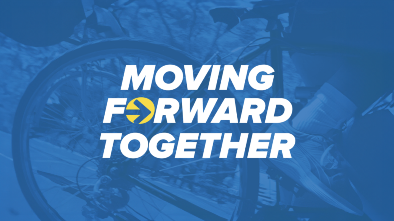 "Moving Forward Together" word mark over photo of people biking