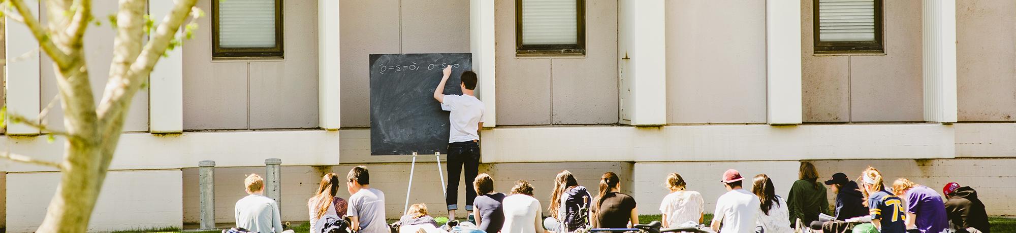 uc davis class being taught outdoors in the sunshine