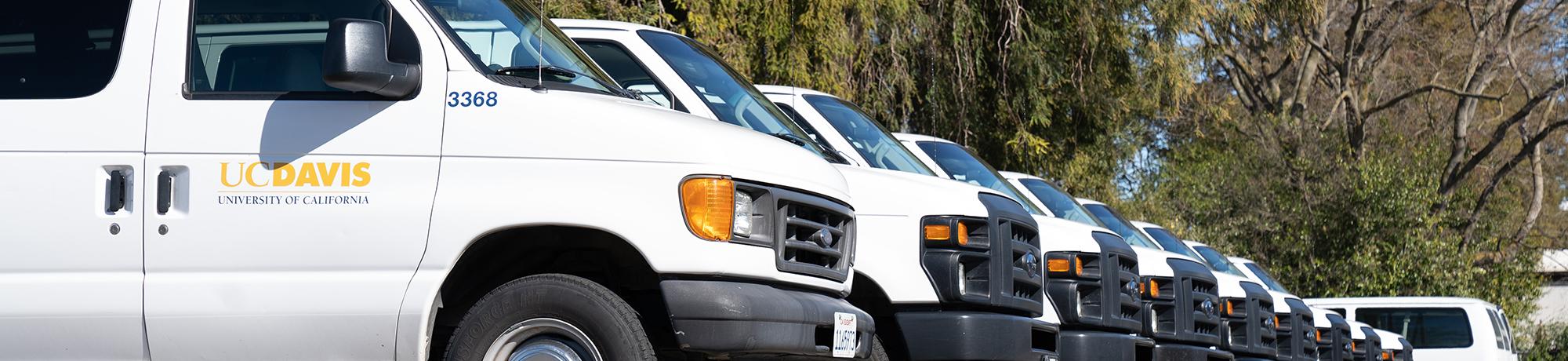 row of uc davis campus fleet vans