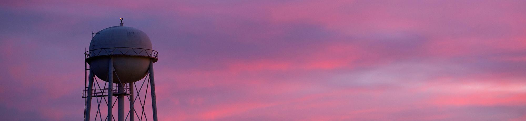 purple sky with water tower